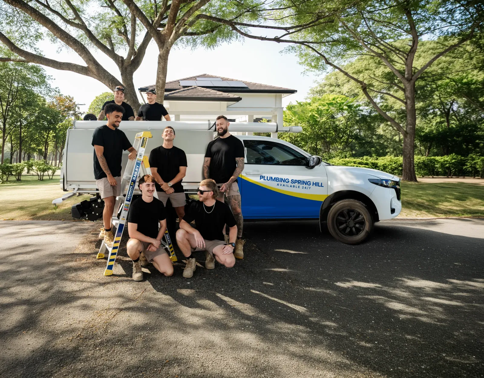 Plumbing Spring Hill ute and team